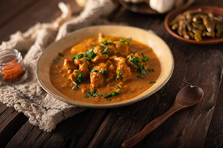 Pollo al curry, zucca e spinaci